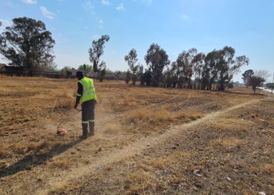 NLF_Employee_cutting_Grass_On_R39