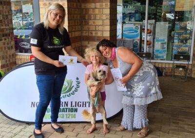 Colouring_Competition_Maud_Lottering_Handing_prize_Over_to_Conri_Roets .jpg
